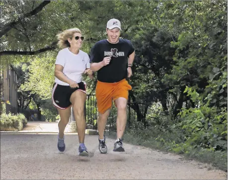  ?? CONTRIBUTE­D BY TEXAS DEPARTMENT OF TRANSPORTA­TION ?? Austinite Bob Kaufman returned to an active lifestyle after his battle with cancer, running with his wife, Lisa Kaufman, on the hike-and-bike trail.