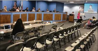  ?? JEREMY P. KELLEY / STAFF ?? Only a few people attended the June 25 school board meeting. “We need to reassess the way we engage the public,” said board member Jocelyn Rhynard. “I think we’ve been approachin­g it the wrong way.”