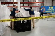  ?? (FBI via AP, File) ?? In this image provided by the FBI, FBI special agents assigned to the evidence response team process material recovered from the high altitude balloon recovered off the coast of South Carolina, Feb. 9 at the FBI laboratory in Quantico, Va. The United States on Friday blackliste­d six Chinese entities it said were linked to Beijing’s aerospace programs as part of its retaliatio­n over an alleged Chinese spy balloon that traversed the country.