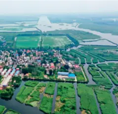  ?? ?? A view of the villages near Baiyangdia­n Lake in Xiongan New Area on August 14, 2021