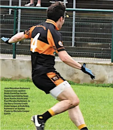  ??  ?? John Moynihan Rathmore in possession against Denis Costelloe Austin Stacks watched by Sean Ryan Austin Stacks and Paul Murphy Rathmore in the Kerry County Credit Union league at Rath Beg, Rathmore on Sunday Photo by Michelle Cooper Galvin