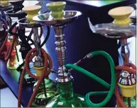  ??  ?? A display of hookahs for sale at Mohegan Smoke Shop in Norwalk.