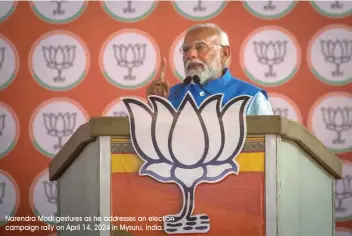  ?? Narendra Modi gestures as he addresses an election campaign rally on April 14, 2024 in Mysuru, India. ??