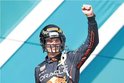  ?? Picture: AFP ?? HOT SHOT. Red Bull’s Dutch driver Max Verstappen celebrates on the podium after winning the Miami F1 Grand Prix at the Miami Internatio­nal Autodrome on Sunday.