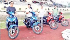  ??  ?? UP FOR GRABS: Henry (from left) and the KDMM Football league organising committees, Mohd Zinin, Mudi Dubing and Andrew Majanggim with the four main prizes for the lucky draw in conjunctio­n with the tournament’s Charity Shield match at Keningau Stadium today.