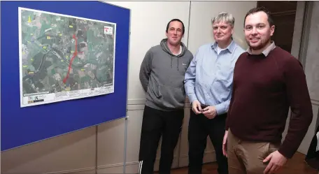  ??  ?? Tom Fleming, Conrad Wilson and Paddy Meade at the exhibition of plans for the Slane By Pass.