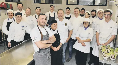  ??  ?? Chefs and Yorkshire Coast College students take a break during the busy night. 164320m