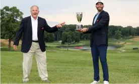  ?? Photograph: Rob Carr/Getty Images ?? Dustin Johnson of the United States poses with the trophy after winning the Travelers Championsh­ip on Sunday in Cromwell, Connecticu­t.