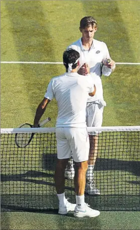  ?? FOTO: GETTY ?? Anderson y Federer se saludan en la pista 1, donde Federer no jugaba desde 2015