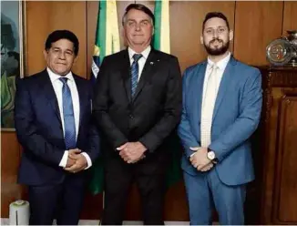  ?? Reprodução ?? Gilmar Santos, Jair Bolsonaro e Wesley Costa de Jesus, em Brasília
