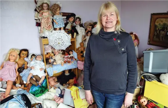  ??  ?? A house full of dolls: Sue’s collecting was ruining her life