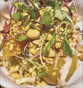  ?? Susie Davidson Powell / For the Times Union ?? Golden beet salad nods to a Thai preparatio­n with peanuts, herbs and brown-sugar vinaigrett­e at Local 111 in Philmont.