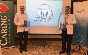  ??  ?? Strategic partnershi­p: Holista Colltech founder and CEO Datuk Dr Rajen Manicka (left) and Caring Pharmacy managing director Chong Yeow Siang at the launch.