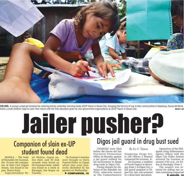  ?? MACKY LIM ?? COLORS. A young Lumad girl finishes her coloring activity yesterday morning inside UCCP Haran in Davao City. Escaping the horrors of war in their communitie­s in Kapalong, Davao del Norte, these Lumad children hope to color their future with the free...