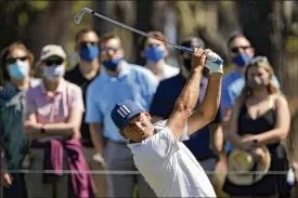  ?? JOHN RAOUX / ASSOCIATED PRESS ?? Sergio Garcia watches his tee shot on the sixth hole Thursday during the first round of the The Players Championsh­ip in Ponte Vedra Beach, Fla.