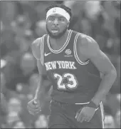  ?? RICH PEDRONCELL­I/AP ?? Knicks center Mitchell Robinson during the first quarter against the Kings in Sacramento, Calif. on Friday.