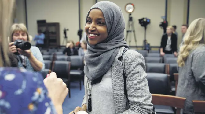  ??  ?? Representa­tive-elect Ilhan Omar speaks to the media after a lottery for office assignment­s on Capitol Hill in Washington, Nov. 30.