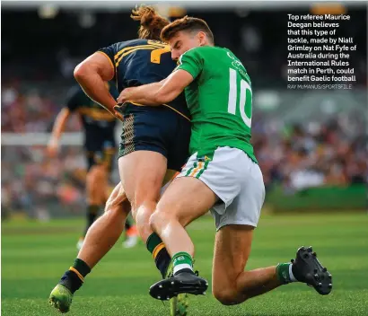  ?? RAY McMANUS/SPORTSFILE ?? Top referee Maurice Deegan believes that this type of tackle, made by Niall Grimley on Nat Fyfe of Australia during the Internatio­nal Rules match in Perth, could benefit Gaelic football