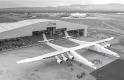  ?? COURTESY OF STRATOLAUN­CH SYSTEMS CORP. ?? Paul Allen’s Stratolaun­ch airplane emerges from its hangar in Mojave, Calif., on May 31.