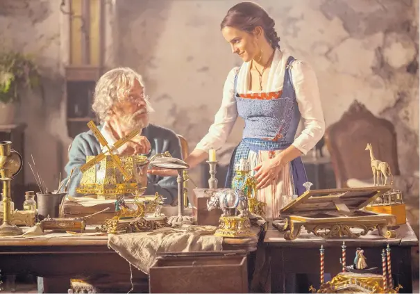  ?? COURTESY OF LAURIE SPARHAM/DISNEY ?? Emma Watson as Belle and Kevin Kline as Maurice in a scene from “Beauty and the Beast.”