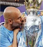  ?? ?? City boss Pep Guardiola with the Premier League trophy
