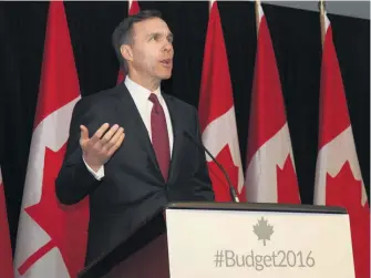  ??  ?? Bill Morneau en conférence de presse pendant le huis clos des médias le 22 mars.