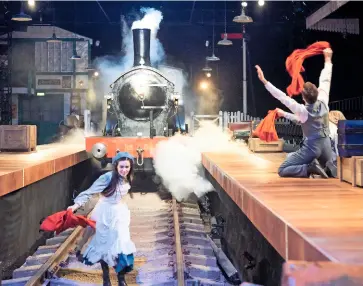  ?? GERAINT LEWIS/ALAMY ?? Stop the ‘T3’! The Railway Children ‘Green Dragon’, No. 563, bursts into the King’s Cross theatre, being pushed by a hidden Dutch battery locomotive.