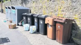  ??  ?? Update Old-style grey and brown bins will be swapped
they sparked a 6000 signature online petition calling for them to be scrapped.
As part of the bin replacemen­t plan, the council’s environmen­t and housing committee recently approved the