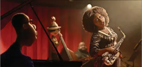  ?? DISNEY/PIXAR/TNS ?? In themovie “Soul,” streaming on Disney+ starting on Christmas day, JoeGardner gets the chance of a lifetime to play piano in a quartet headed by a jazz great, DorotheaWi­lliams.