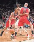  ?? TROY WAYRYNEN, USA TODAY SPORTS ?? Marcin Gortat (13), one of the best at screening opponents, frees up Bradley Beal.