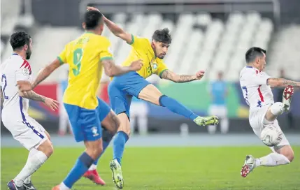  ??  ?? SUPER-SUB: Brazil’s Lucas Paqueta scores against Chile during their Copa America quarterfin­al match in Rio de Janeiro.