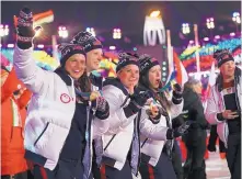  ?? NATACHA PISARENKO/ASSOCIATED PRESS ?? U.S. athletes walk in the stadium during the closing ceremony of the 2018 Winter Olympics in PyeongChan­g, South Korea, on Sunday.