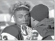  ?? Arkansas Democrat-Gazette/BENJAMIN KRAIN ?? Warren’s Treylon Burks is consoled after Saturday’s game. Burks had 383 all-purpose yards and scored four touchdowns.