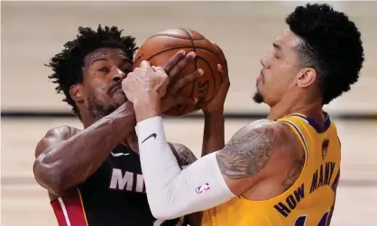  ??  ?? Danny Green (right) battles Jimmy Butler for the ball during Game 4 of the NBA finals. Photograph: Mark J Terrill/AP