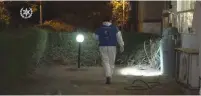  ?? (Israel Police) ?? A POLICEMAN inspects the scene of the murder in Holon early Wednesday morning.