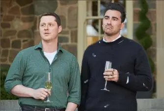  ?? Pop TV ?? “Schitt’s Creek” returns Tuesday for its final season, with Noah Reid, left, as Patrick and Dan Levy as David.