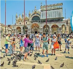  ?? ISTOCK ?? Venice’s city stay taxes no doubt help pay for the impact of all those tourists.