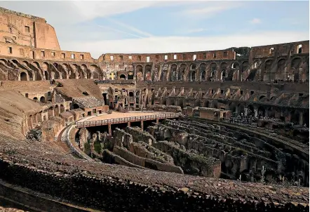  ?? GETTY IMAGES ?? Officials in charge of the Colosseum have launched an ambitious project to recreate the arena’s floor, complete with the trapdoors and hidden lifts that were used to bring wild animals into the arena.