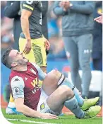  ??  ?? John Mcginn after breaking his ankle