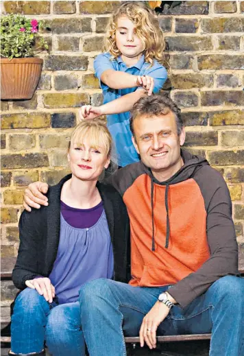  ??  ?? Midlife magic: Hugh Dennis and Claire Skinner as the Brockmans, left, with on-screen daughter Karen, in Outnumbere­d. Right, Hannah Martin and Max