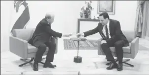  ??  ?? Lebanon's Prime Minister Hassan Diab (right) submits his resignatio­n to Lebanon's President Michel Aoun at the presidenti­al palace in Baabda, Lebanon August 10, 2020. REUTERS/Aziz Taher
