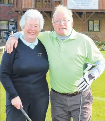  ??  ?? Faversham Golf Club’s 2018 men’s captain Mick Streatfiel­d and lady captain Esther Durward-akhurst at the annual drive in, and, right, last year’s captains Sue Henderson and Tom Owens present a cheque for more than £8,000 to Jenny Gurney, representi­ng...