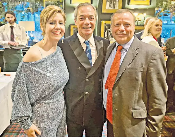  ?? ?? Nigel Farage, centre, flanked by Dame Andrea Jenkyns, the Conservati­ve MP, and Arron Banks, the former Ukip donor. Dame Andrea called Mr Farage ‘one of the most influentia­l politician­s of our generation’