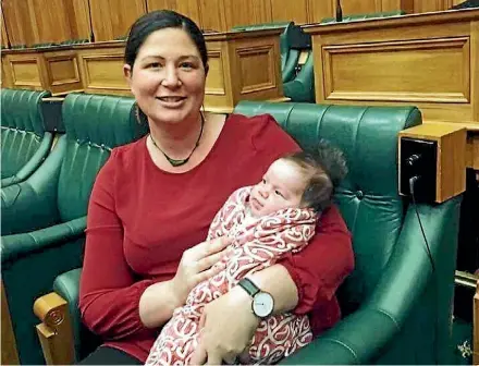  ??  ?? New Labour MP Willow-Jean Prime with two-month-old Heeni in Parliament.