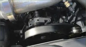  ??  ??  With a set of 60% over River City Diesel injectors to feed, rail pressure is maintained thanks to a dual high-pressure fuel kit from H&amp;S Motorsport­s. The two-pump system retains the factory Bosch CP4.2 in the valley but adds a belt-driven CP3 intended for a 6.7L Cummins applicatio­n to the mix. Here you can see the CP3’S mounting location right behind the fan shroud, where an optional second alternator would go.