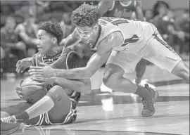  ?? Don Petersen Associated Press ?? ST. FRANCIS GUARD Ramiir Dixon-Conover, left, has the ball and Virginia Tech’s Ahmed Hill wants it during the 13th-ranked Hokies’ victory.