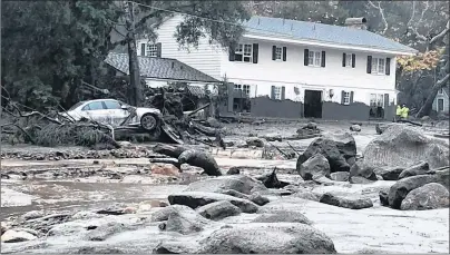 ?? AP PHOTO ?? In this photo provided by Santa Barbara County Fire Department, mud and debris flow due to heavy rain in Montecito, Calif., Tuesday.