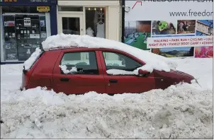  ??  ?? Hopefully we won’t have to deal with this level of snow again for another few decades.