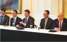  ?? New York Times ?? Randall Stephenson (second from right) CE of AT&T, at a meeting with President Donald Trump in Washington, June 22. Eight months into its review of AT&T’s bid for Time Warner, the Justice Department still faces stumbling blocks.