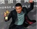  ?? ?? Taiwanese actor Hu Jhih-ciang jumps to celebrate after winning the Best New Performer.